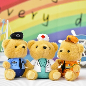 Detail of plush teddy bear keychains in police, nurse, and traffic police uniforms.