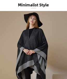 Detail of soft knit material on this grey striped poncho with contrast trim design