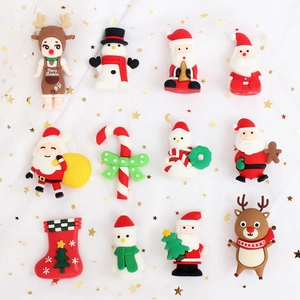 12-piece Christmas soft rubber cake toppers featuring Santa, Snowman and Reindeer
