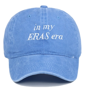 Detail of in my ERAS era embroidery on vintage washed sky blue cotton baseball cap