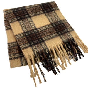 Thick beige and dark brown checkered mohair scarf with soft fringe on white background