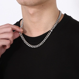 Hip hop silver titanium steel Cuban chain necklace worn by a male model for styling