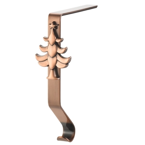 Detail of Christmas stocking holder with metal tree design in antique bronze finish