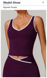 Detail of contrast white webbing on grape purple yoga vest and high-waist leggings