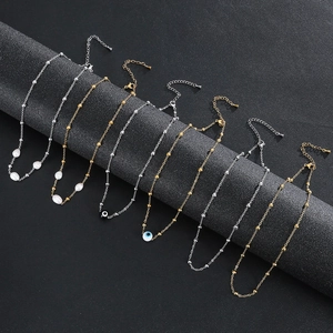 Classic stainless steel beaded chain bracelets with pearls and evil eye charms