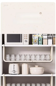 Under cabinet white metal storage basket holding glass cups in a modern kitchen