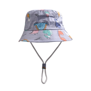 Detailed view of child sun hat with colorful dinosaur print and adjustable chin strap