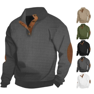 Detail of waffle knit texture and buttoned neck on men casual henley sweater