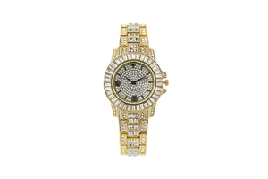 Dettaglio orologio dorato di lusso con lunetta, quadrante e cinturino in strass