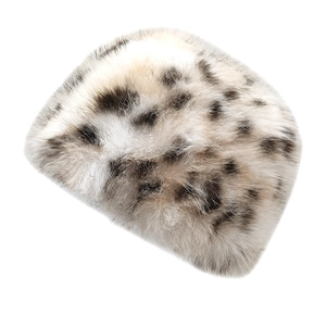 Winter leopard print faux fur bucket hat with warm plush texture in cream and brown