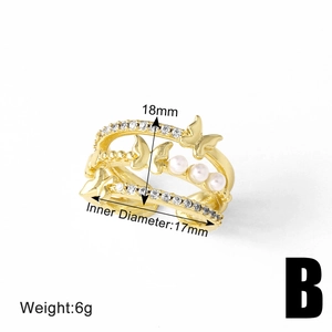 Detailed view of gold layered butterfly ring with pearls and dimensions 18mm