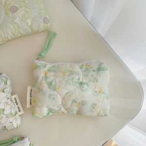Quilted floral cotton mini pouch with zipper and simple wish label for daily essentials