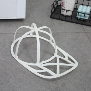 White plastic baseball cap washer frame for laundry protection against deformation