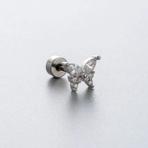 Titanium steel butterfly stud earring with zircon crystals on grey background