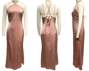 Detail of cross-back straps and silky satin fabric on this backless bodycon dress