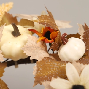 Autumn wreath featuring white mini pumpkins, maple leaves, and orange sunflowers decoration