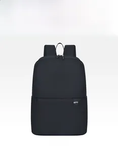 Detailed front view of black lightweight backpack showing water-resistant nylon texture