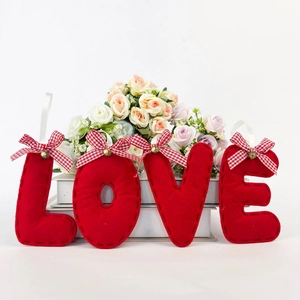 Red felt LOVE letter ornaments with plaid bows and bells for Christmas tree decoration