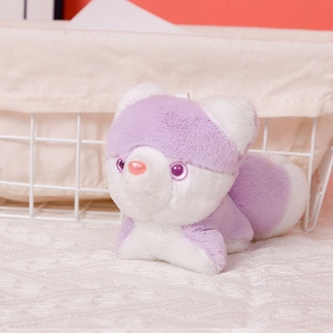 Close-up of a purple husky plush keychain with soft fur and plastic eyes
