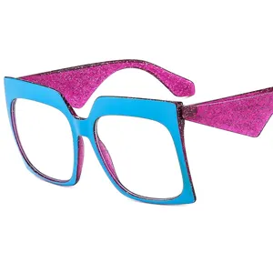 Oversized blue square glasses with purple glitter temples shown from a front angle view