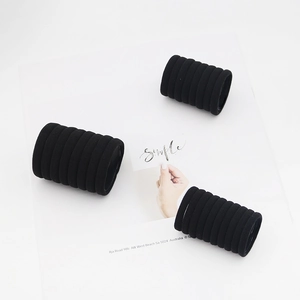Detailed view of 30 pieces black seamless high-elastic hair ties in 3 sets of 10