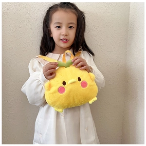 Toddler girl wearing a soft yellow plush chicken backpack during outdoor travel