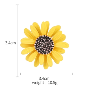 Yellow enamel sunflower brooch, size 3.4cm and weight 10.5g, on a white background