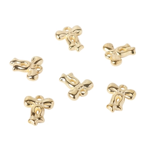 Golden CCB bow-knot charm beads for DIY jewelry making on white background