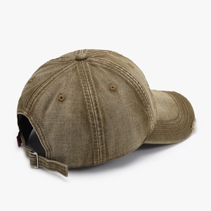 Vintage washed cotton baseball cap with distressed brim and metal adjustable buckle