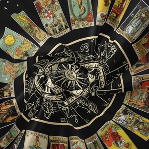 Macro shot of tarot and zodiac wall tapestry featuring golden celestial sun patterns