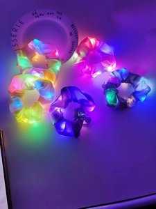 Detailed set of five LED glowing organza hair scrunchies in various vibrant neon colors