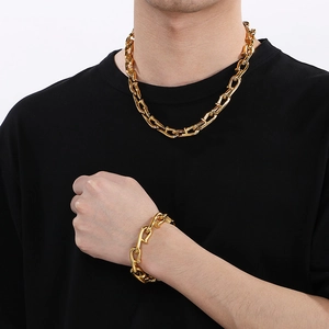 Golden horsebit link chain necklace and bracelet set for men in vintage industrial style