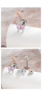 Macro detail of butterfly cartilage stud earrings with pink blue zircon and flat back
