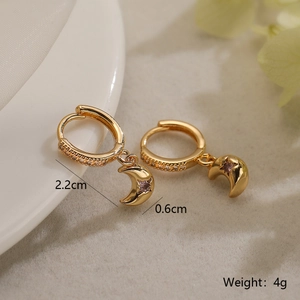 Detail showing 2.2cm gold hoop earrings with moon and star pendants and dimensions