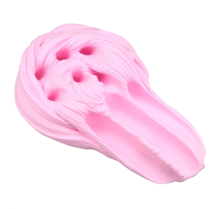 Macro shot of pink cotton butter slime with swirl texture for stress relief toy