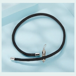 Close-up of black braided cord bracelet with S925 silver clasp for DIY jewelry