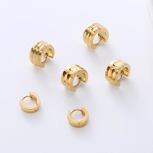 Minimalist gold hoop earring set with triple line and grooved designs for men and women