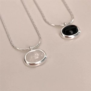 Minimalist 925 sterling silver necklace with oval black agate and white crystal pendants