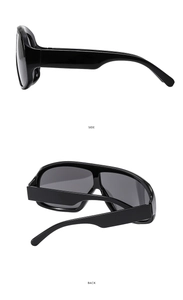 Detail view of large frame sunglasses showing the side and back temple design