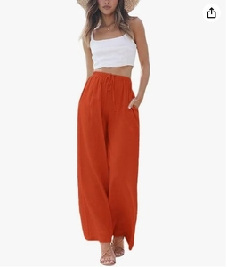 Detail view of orange wide-leg casual pants with drawstring waist and side pockets