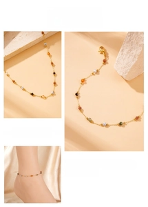 Detailed shot of gold-plated stainless steel anklet with multi-colored natural stone beads