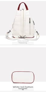 Detail view of white pebbled leather backpack with red accents and adjustable straps