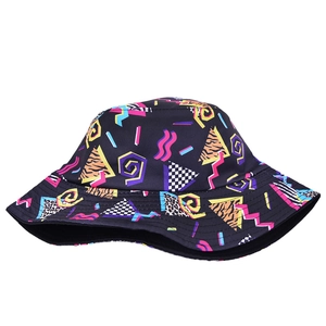 Macro view of patterned bucket hat showing dense stitching and Memphis graffiti print details