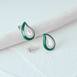 Close-up of s925 silver teardrop earrings with green enamel and white gemstones