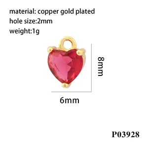 Close-up of 18K gold-plated heart pendant with red cubic zirconia for DIY jewelry