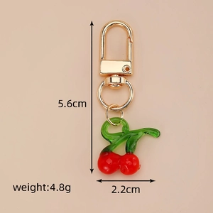 Miniature glass cherry keychain with dimensions 5.6cm height and 2.2cm width detail