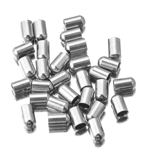 Close-up of polished stainless steel cylinder cord ends for DIY jewelry making