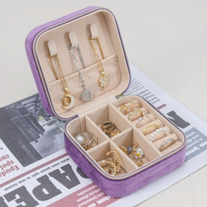 Portable purple velvet jewelry box with square zipper and multi-compartment storage space