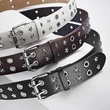 Close-up of tactical belts in white, dark brown and black with star studs and double-pin buckle
