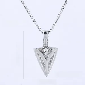 Macro view of arrow-shaped wolf head pendant with precise measurements 45.3mm x 23.0mm